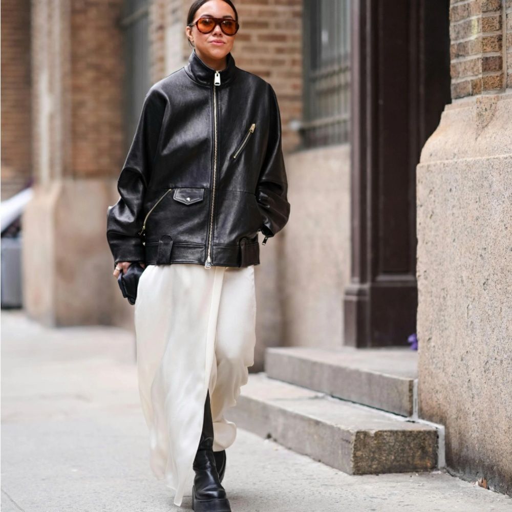 Moto Boho Style. Black Leather Jacket with White Lace Skirt